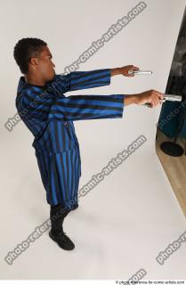 Garson STANDING POSE WITH GUNS 